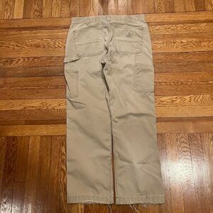 Lightly distressed and faded‎ carhartt carpenter pants